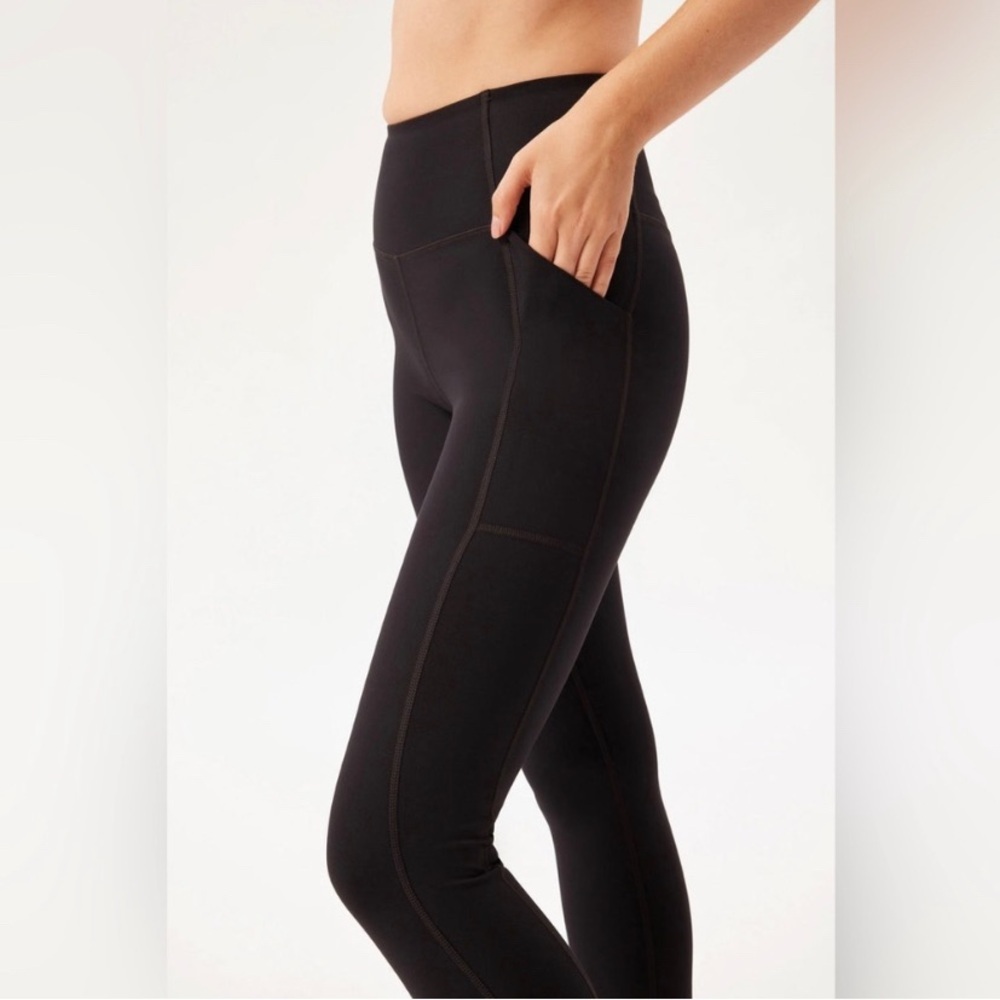 girlfriend collective black high rise compression leggings 7/8s & side pockets